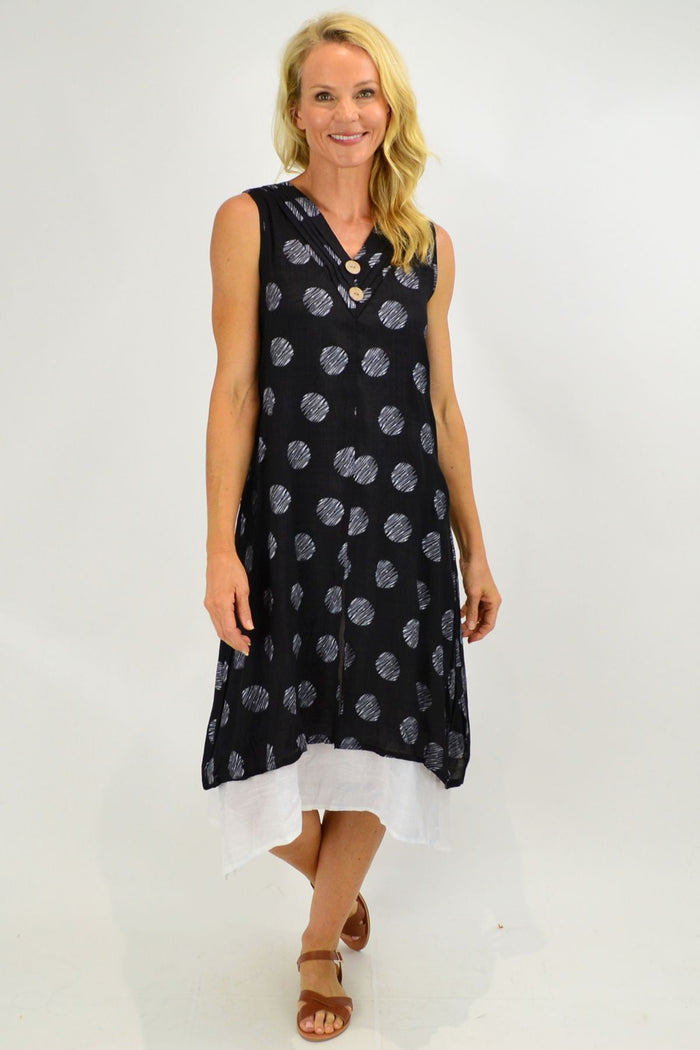 Sleeveless black dots overlay tunic dress by La Mode, featuring a stylish and lightweight design with a relaxed fit.