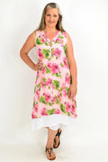 Pink summer garden tunic dress by La Mode displayed on a hanger with floral print and lightweight fabric.
