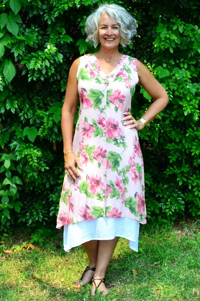 Pink summer garden tunic dress by La Mode featuring floral patterns and lightweight fabric, ideal for casual warm-weather wear.