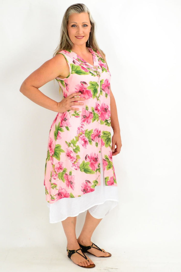 Pink summer garden tunic dress by La Mode featuring floral patterns and lightweight fabric, displayed on a hanger.