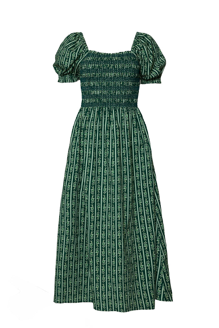 The Sunday Best Dress in Pine Felicity Floral by Ivy City Co features a green, ankle-length design with short puffed sleeves, a smocked bodice, and vertical stripes with delicate florals.
