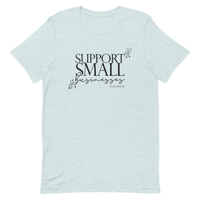 The Sassy Woof Support Small Businesses Tee is a light gray unisex shirt with black "SUPPORT SMALL businesses" text in mixed fonts and playful star and heart doodles—a comfy way to share a positive message.