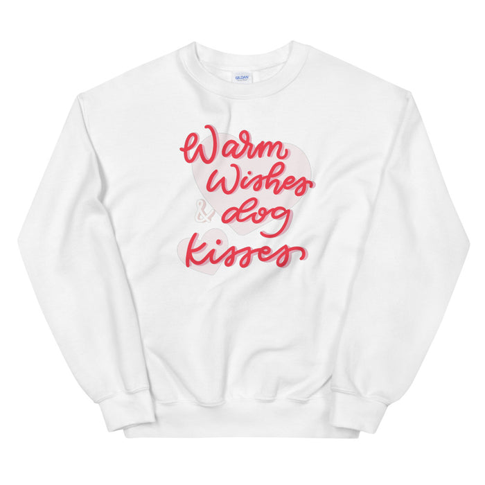 The Sassy Woof Sweatshirt - Warm Wishes & Dog Kisses is a super soft, unisex white top with “Warm Wishes & Dog Kisses” in red and pink script printed across the front.
