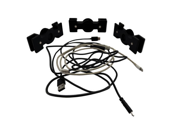 Set of black metal brackets and cables on a white background
