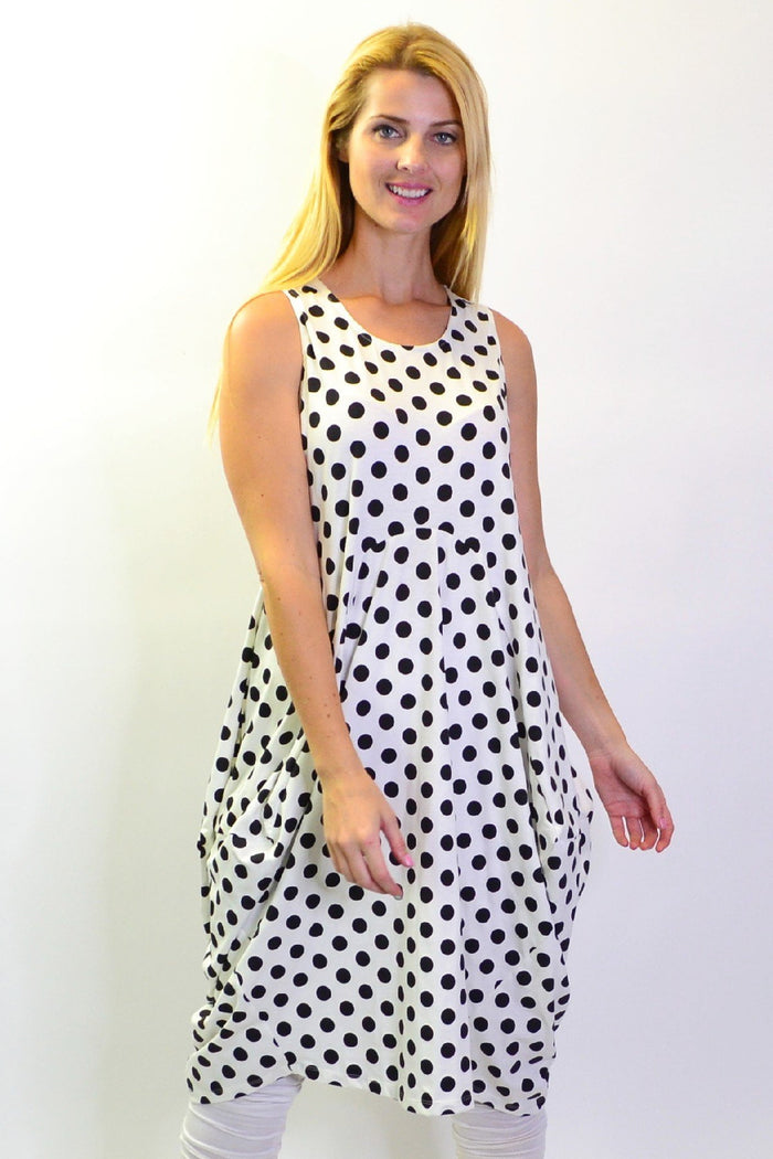 Black and white spotted tunic dress by Cordelia St, featuring a relaxed fit and stylish design, shown on a model.