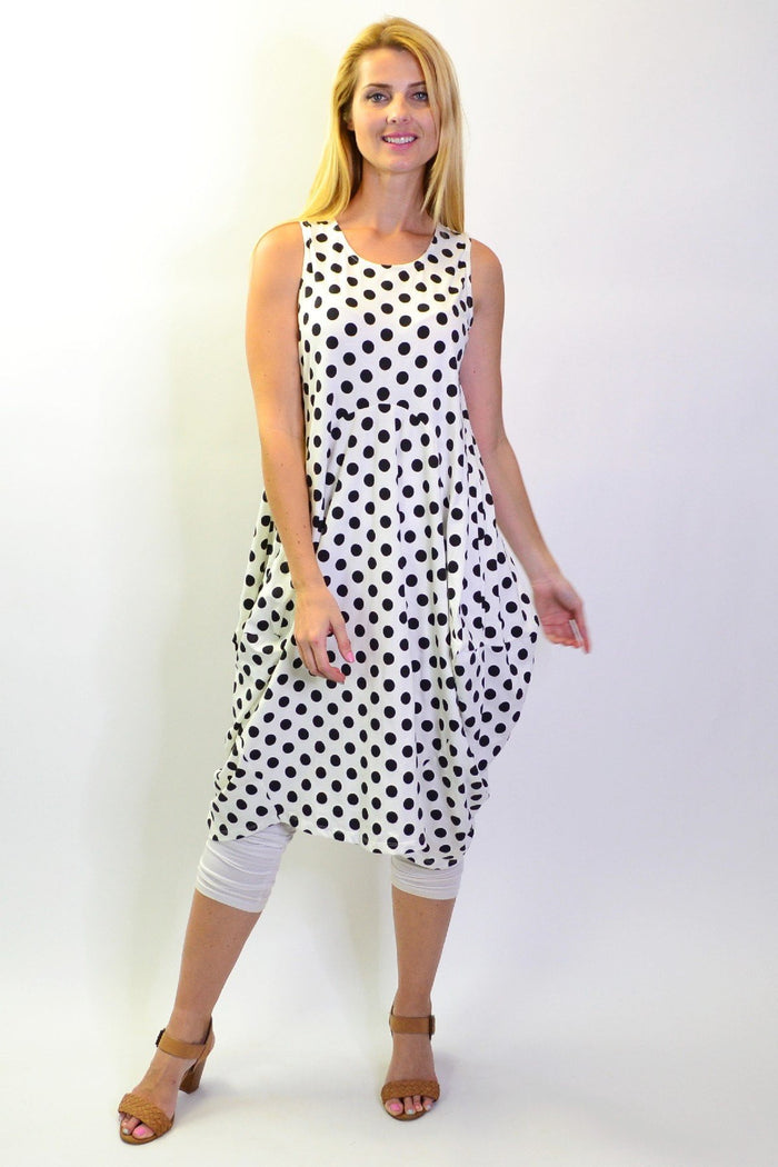 Vivian black and white spot tunic dress by Cordelia St, featuring a relaxed fit with a round neckline and long sleeves.
