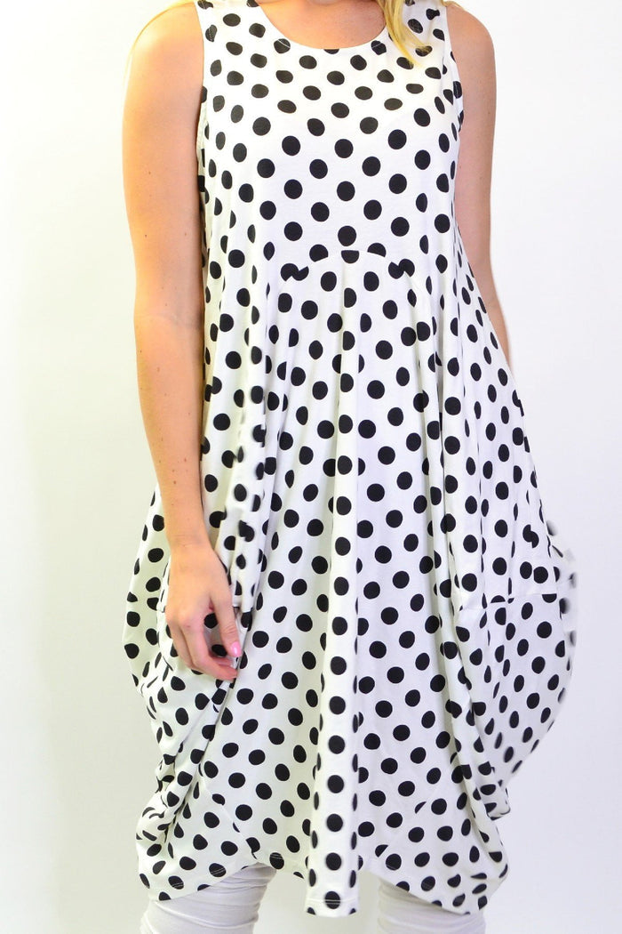 Vivian black and white spot tunic dress by Cordelia St, featuring a stylish, flowy silhouette with bold polka dot pattern.
