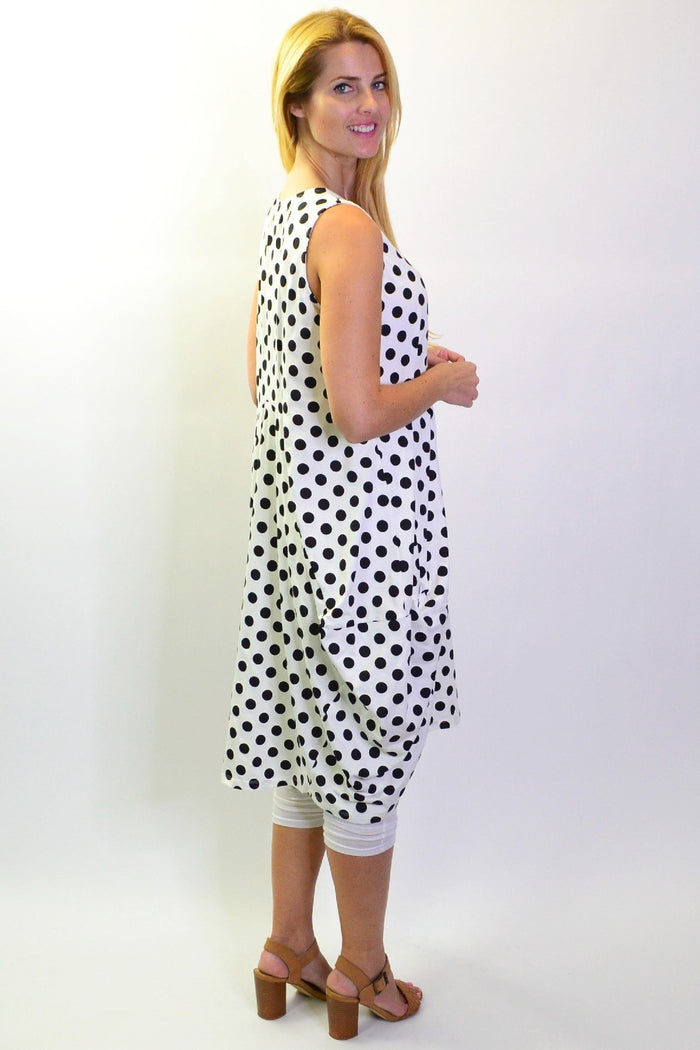 Vivian black and white spot tunic dress by Cordelia St, featuring a stylish white fabric with bold black spots.
